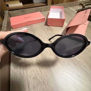 Miu Miu Black Oval Sunglasses
